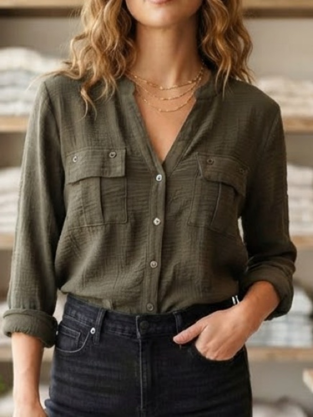 Calvin Klein olive green button down blouse. With beautiful detailed pockets.